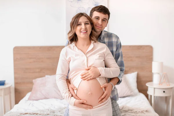 Beautiful Pregnant Couple Bedroom — Stock Photo, Image