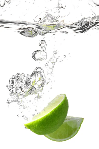 Falling Fresh Cut Lime Water White Background — Stock Photo, Image