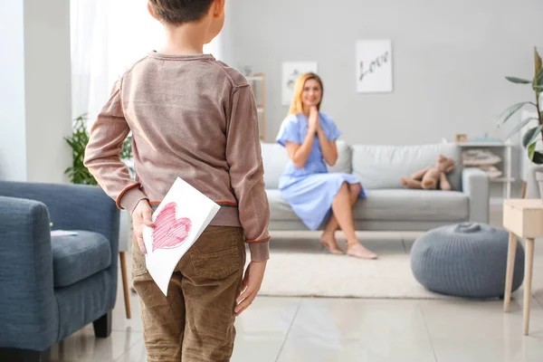 Little Boy Hiding Greeting Card His Mother Back — Stock Photo, Image