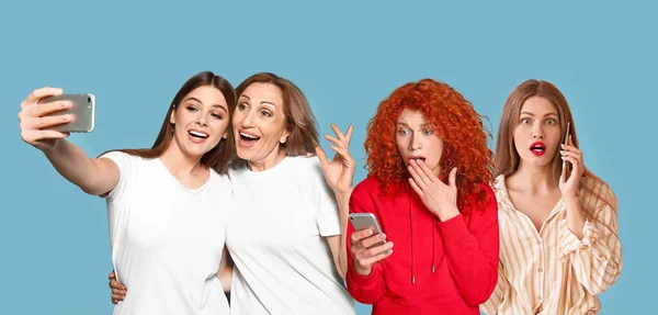 Different Women Using Mobile Phones Color Background — Stock Photo, Image