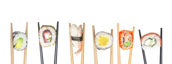 Muchos Palillos Con Sushi Sabroso Sobre Fondo Blanco — Foto de Stock