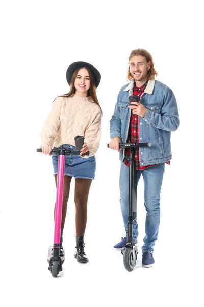 Young Couple Kick Scooters Cups Coffee White Background — 스톡 사진