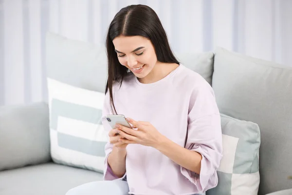 Young Woman Mobile Phone Sitting Sofa Home — Stock Photo, Image