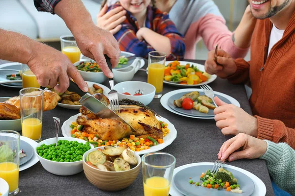 Family celebrating Thanksgiving Day at home