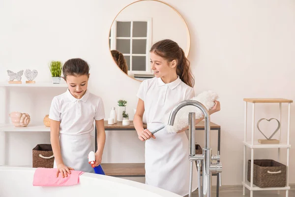 Cute Little Chambermaids Cleaning Bathroom — Stock Photo, Image