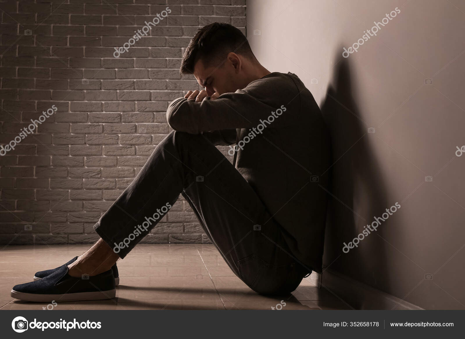 Depressed Young Man Grey Wall Stock Photo by ©serezniy 352658178