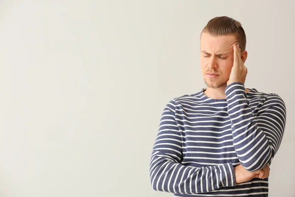 Worried Young Man Light Background — Stock Photo, Image