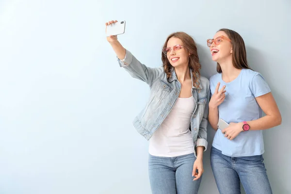 Young Women Taking Selfie Color Background — Stock Photo, Image