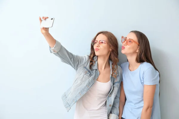 Young Women Taking Selfie Color Background — Stock Photo, Image