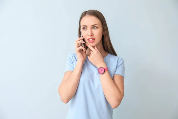 Young Woman Talking Mobile Phone Color Background — Stock Photo, Image