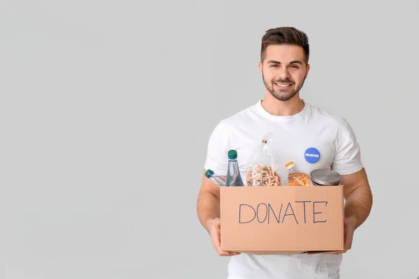 Voluntariado Con Donaciones Para Personas Pobres Sobre Fondo Claro — Foto de Stock