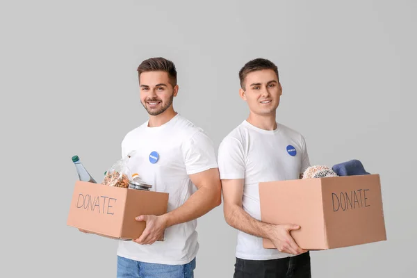 Volunteers Donations Poor People Light Background — Stock Photo, Image