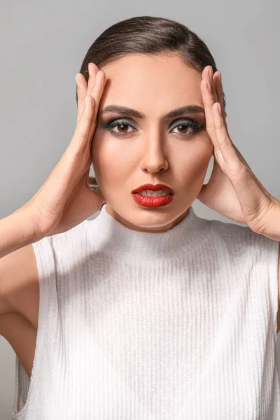 Young Woman Beautiful Makeup Grey Background — Stock Photo, Image