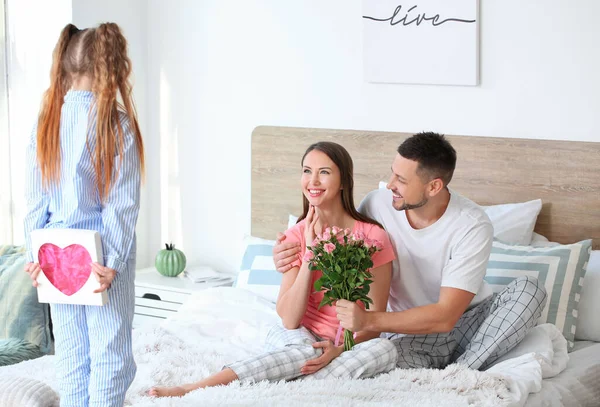 Husband Little Daughter Greeting Woman Mother Day Bedroom — Stock Photo, Image