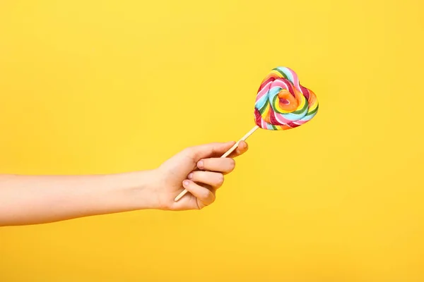 Female Hand Sweet Lollipop Color Background — Stock Photo, Image