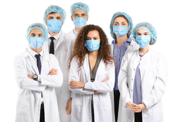 Gruppe Von Ärzten Mit Schutzmasken Auf Weißem Hintergrund Konzept Der — Stockfoto