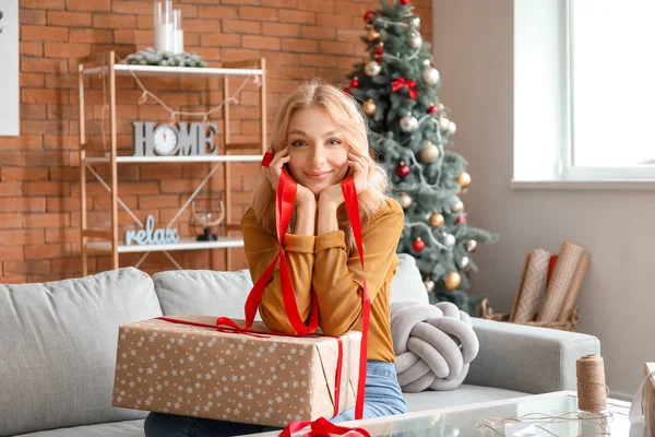 Beautiful Young Woman Wrapping Christmas Gifts Home — Stock Photo, Image
