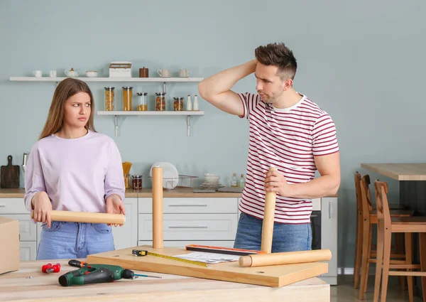 Emotional Couple Assembling Furniture Home — Stock Photo, Image