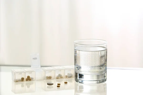 Glass Clean Water Pills Table — Stock Photo, Image
