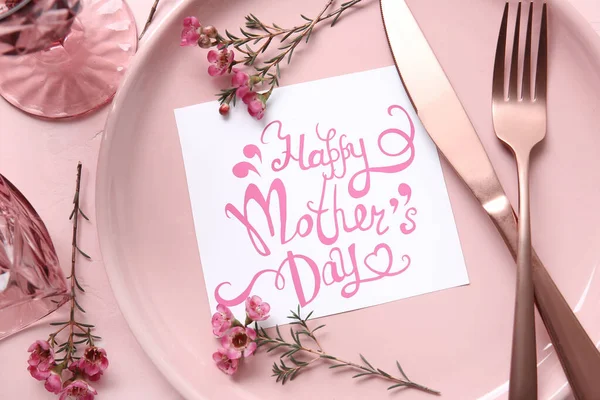 Table setting with card for Mother\'s day dinner, closeup