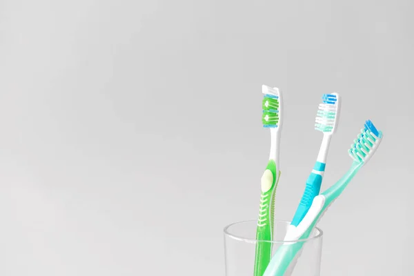 Tooth Brushes Glass Light Background — Stock Photo, Image