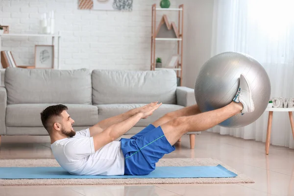 Sporty Young Man Training Home — Stock Photo, Image