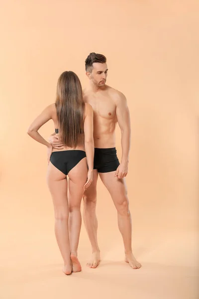 Young Couple Underwear Color Background — 스톡 사진