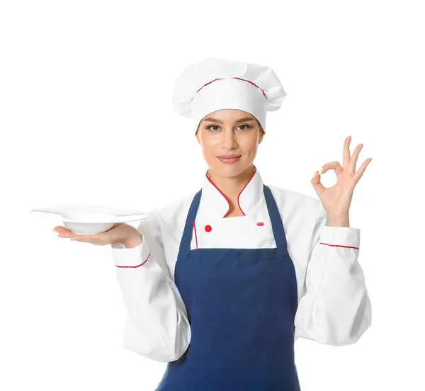 Hermosa Chef Femenina Con Plato Vacío Que Muestra Sobre Fondo — Foto de Stock