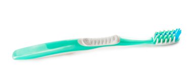 Beyaz arkaplanda diş fırçası