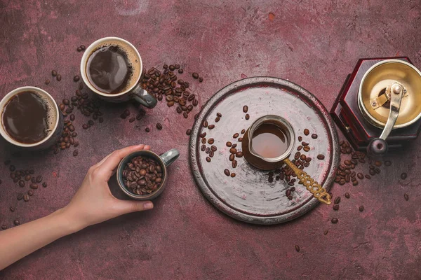 Female Hand Cups Different Coffee Jezve Grinder Color Background — Φωτογραφία Αρχείου