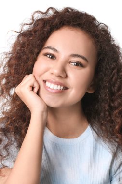 Happy woman with healthy teeth on white background