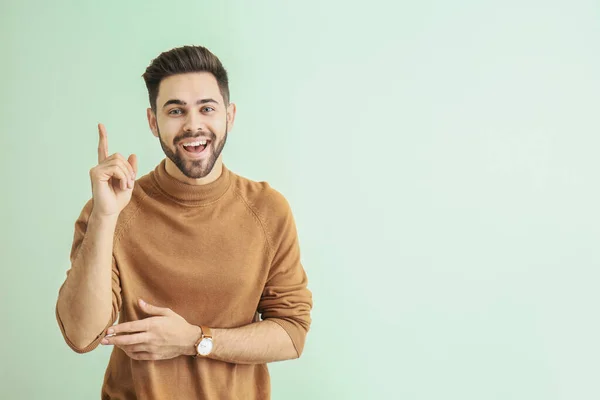 Handsome Young Man Raised Index Finger Color Background — Stock Photo, Image