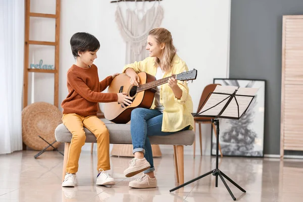 Private Music Teacher Giving Guitar Lessons Little Boy Home — Stock Photo, Image