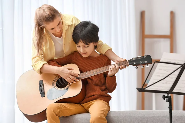 Private Music Teacher Giving Guitar Lessons Little Boy Home — Stockfoto