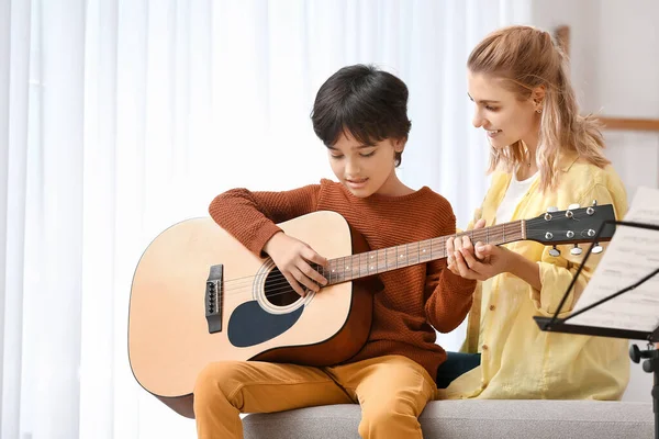 Private Music Teacher Giving Guitar Lessons Little Boy Home — Stock Photo, Image