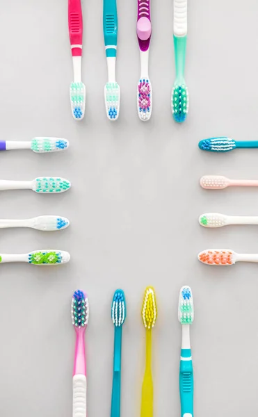 Many Tooth Brushes Light Background — Stock Photo, Image