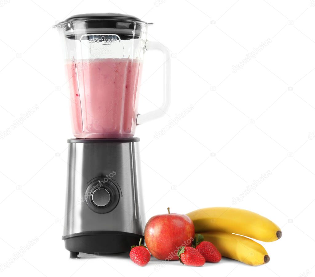 Blender with ingredients for healthy smoothie on white background