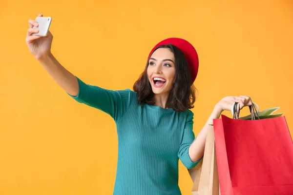 Beautiful Young Woman Shopping Bags Taking Selfie Color Background — Stock Photo, Image