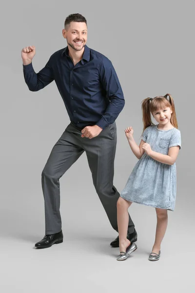 Father His Little Daughter Dancing Grey Background — Stock Photo, Image