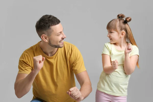 Father His Little Daughter Dancing Grey Background — Stock Photo, Image
