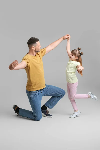 Father His Little Daughter Dancing Grey Background — Stock Photo, Image