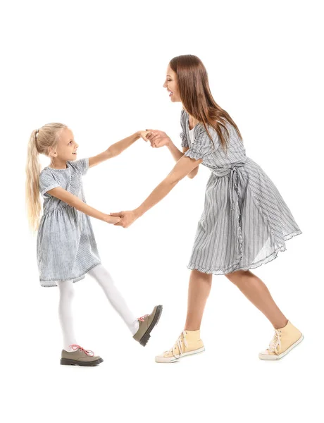 Vrouw Haar Dochtertje Dansen Tegen Witte Achtergrond — Stockfoto