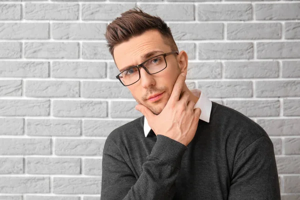 Portrait Handsome Young Man Grey Brick Background — Stock Photo, Image