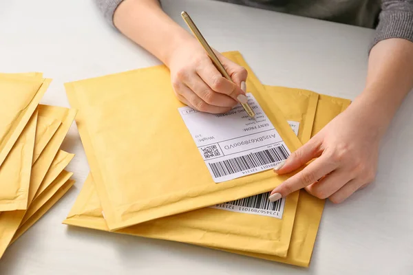 Woman Preparing Parcel Delivery Table — Stock Photo, Image