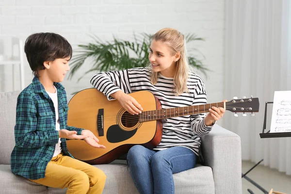 Private Music Teacher Giving Guitar Lessons Little Boy Home — Stock Photo, Image