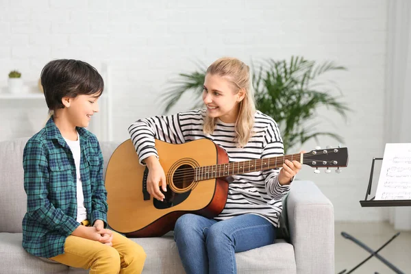 Private Music Teacher Giving Guitar Lessons Little Boy Home — Stockfoto