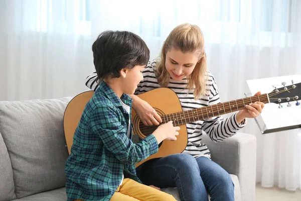 Private Music Teacher Giving Guitar Lessons Little Boy Home — 图库照片