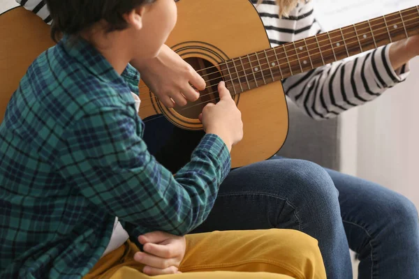 Private Music Teacher Giving Guitar Lessons Little Boy Home — Stockfoto