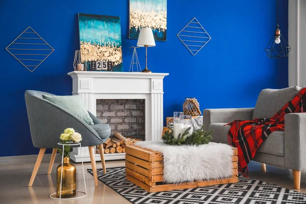 Interior of modern living room with blue wall
