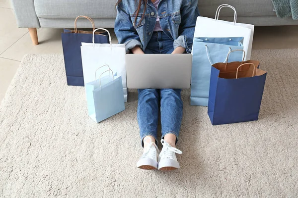 Young Woman Laptop Shopping Bags Home — Stock Photo, Image